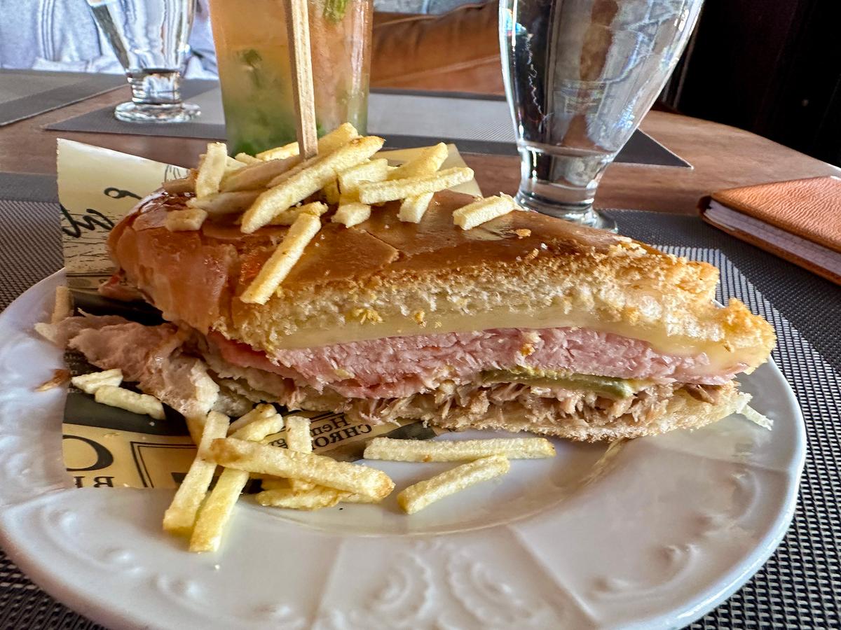 Many cafes in Little Havana serve Cuban sandwiches as a staple lunch item. (Tim Johnson)