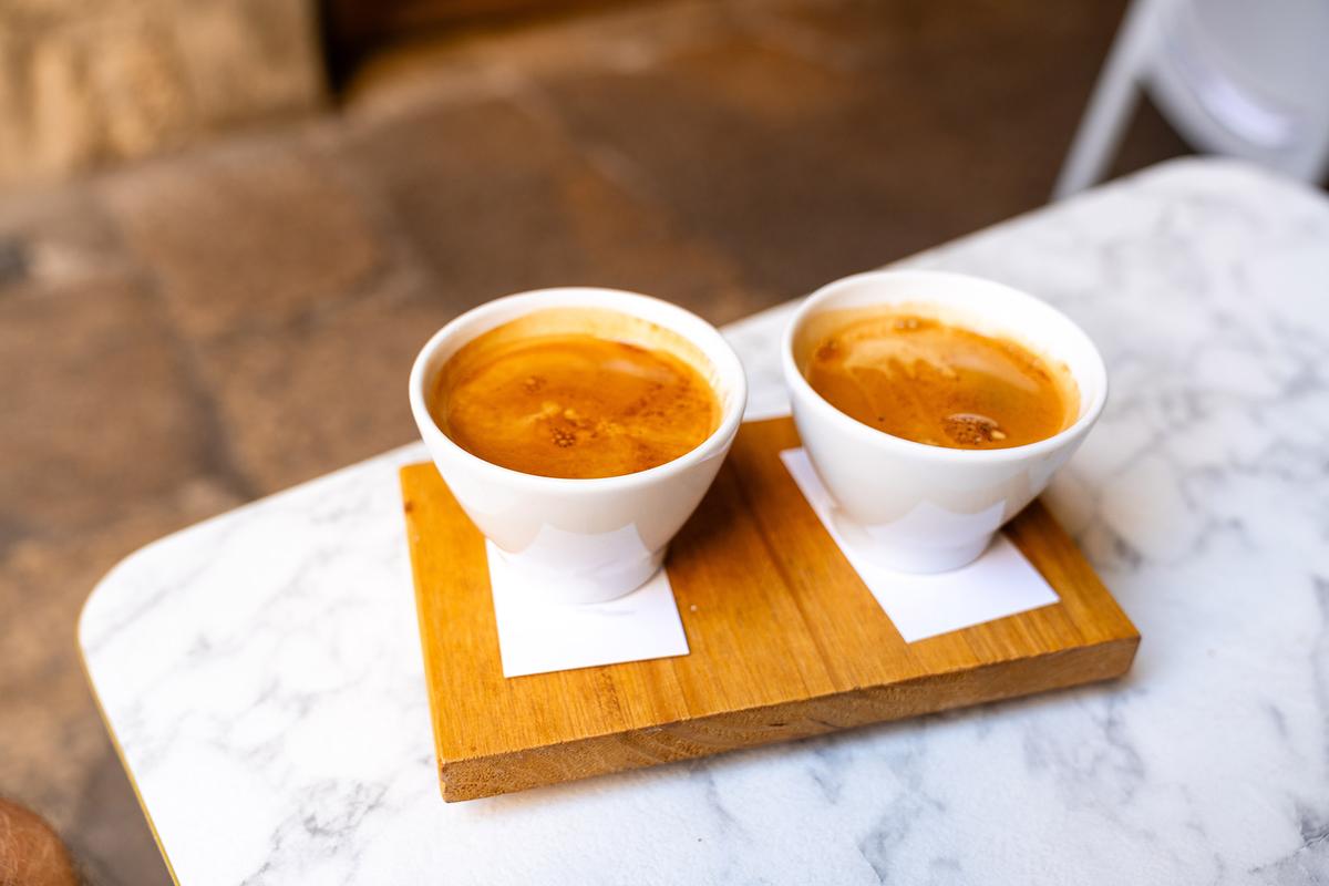 Cuban espresso, a sweet espresso drink, is brewed using finely ground dark-roast coffee and traditionally sweetened with whipped sugar foam. (bonn bonn foto/Shutterstock)