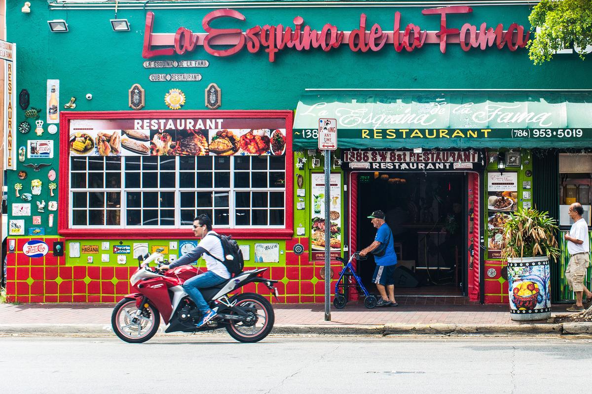 Little Havana developed as a hub for Cuban immigrants in the 1960s. Street murals, cigar shops, and Latin venues contribute to its distinct identity. (Willowtreehouse/Shutterstock)