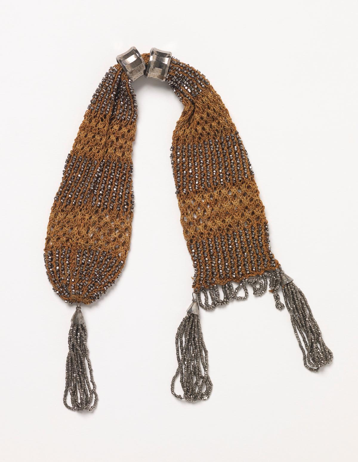 A miser's purse, 1830–1860, from France. Silk, steel beads; 14 3/16 inches by 1 9/16 inch. Cooper Hewitt, Smithsonian Design Museum, New York City. (Public Domain)