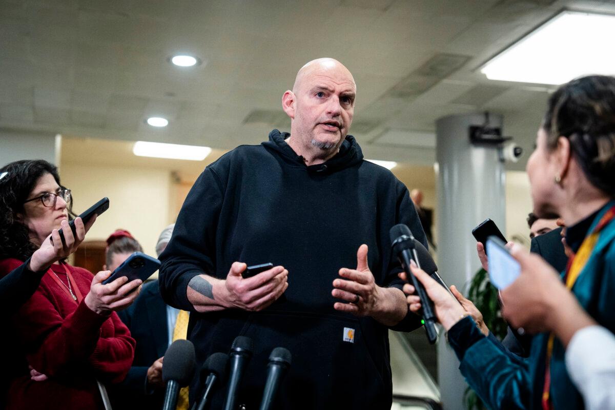 Sen. John Fetterman (D-Pa.) speaks to the press on Capitol Hill in Washington on March 3, 2026. (Madalina Kilroy/The Epoch Times)