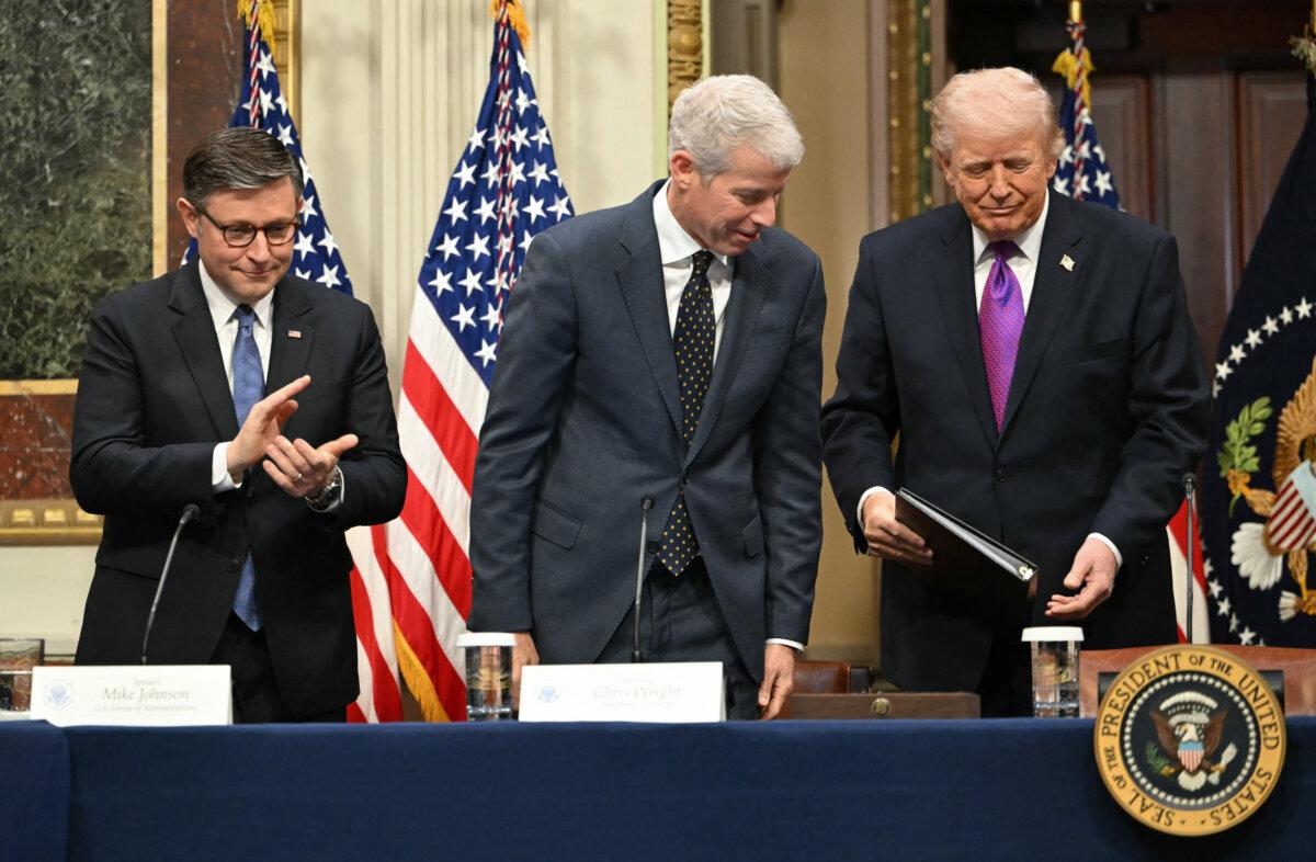 (L–R) Speaker of the House Mike Johnson, Energy Secretary Chris Wright, and President Donald Trump in the Eisenhower Executive Office Building on the White House campus on March 4, 2026. (Andrew Caballero-Reynolds/AFP via Getty Images)