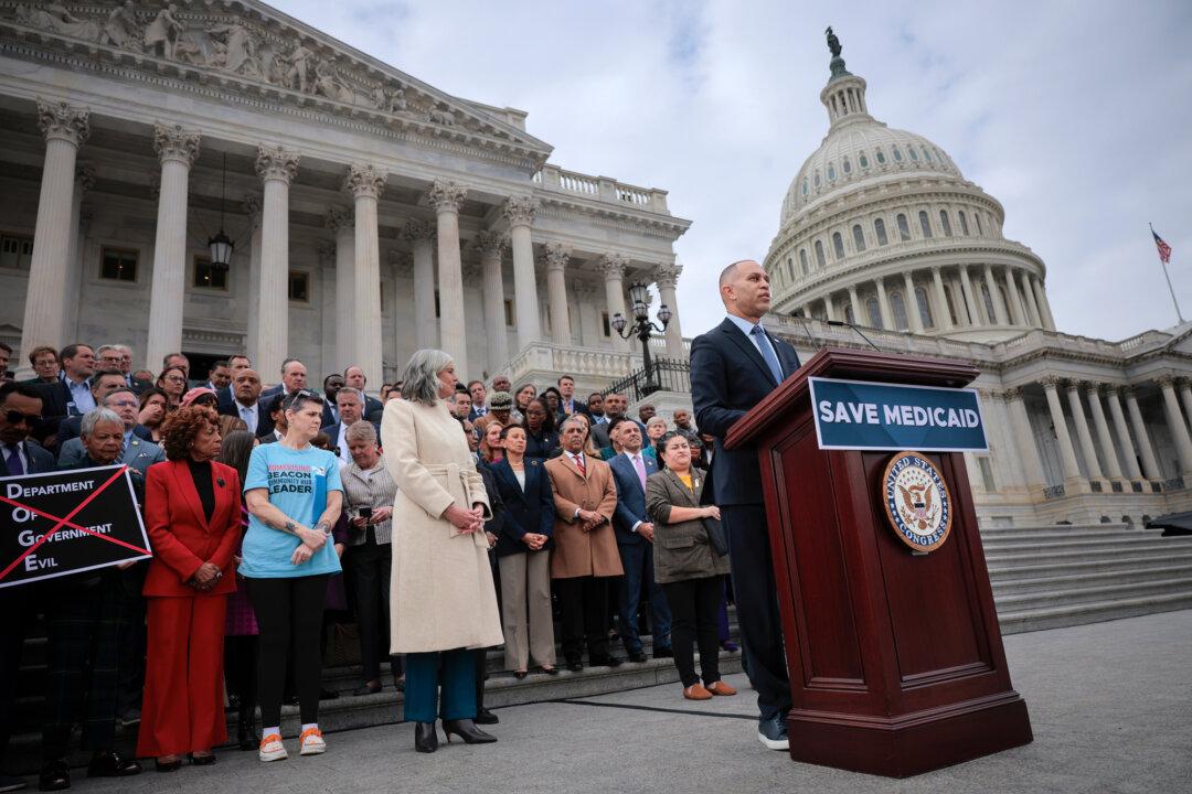 House Minority Leader Hakeem Jeffries (D-N.Y.), joined by fellow Democrats, speaks against the Republican budget bill outside of the US Capitol on Feb. 25, 2025. Democrats generally favor increased government intervention in the form of regulation and subsidization with the goal of ensuring access to health care services for everyone. (Chip Somodevilla/Getty Images)