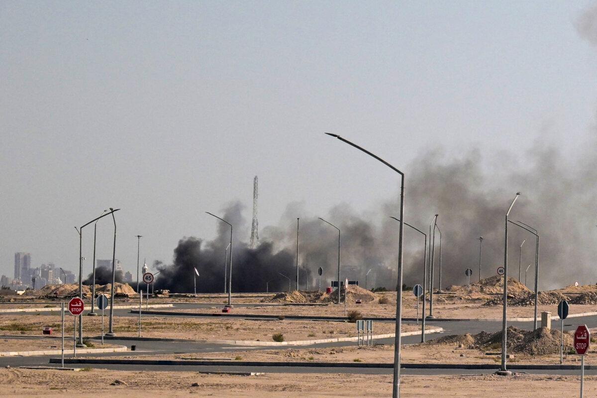 Smoke rises from a reported Iranian strike in the area where the U.S. Embassy is located in Kuwait City, on March 2, 2026. (AFP via Getty Images)