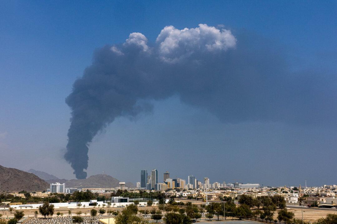 FUJAIRAH, UNITED ARAB EMIRATES - MARCH 05: Smoke rises after an explosion in the industrial zone, caused by debris after interception of a drone by air defence, according to the Fujairah media office on March 05, 2026, in Fujairah, United Arab Emirates. In recent days, Iran has fired drones and missiles toward the UAE and other Gulf states, following the joint U.S.-Israeli attack on Iran that began on February 28. Foreign ministers from the Gulf Co-operation Council (GCC) held an online meeting on March 1 and issued a statement saying they will take "all necessary measures" to defend their security and territory, condemning Iran's attacks as "heinous." (Photo by Christopher Pike/Getty Images)