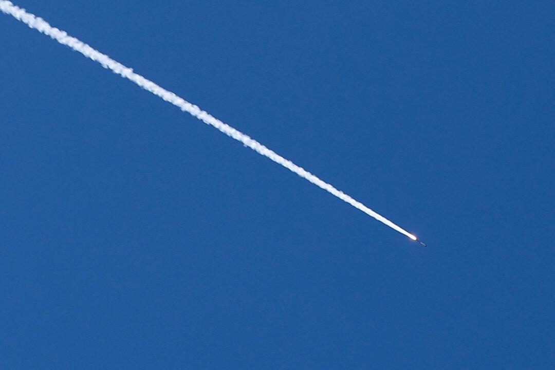 A rocket trail is seen in the sky above the Israeli coastal city of Tel Aviv on March 5, 2026. Iran's army said it had carried out drone strikes in Israel on March 5 including a radar site. The strikes hit "targets in Tel Aviv as well as Meron radar base" in Israel's north, the army said as quoted by state TV. (Photo by Jack GUEZ / AFP via Getty Images)