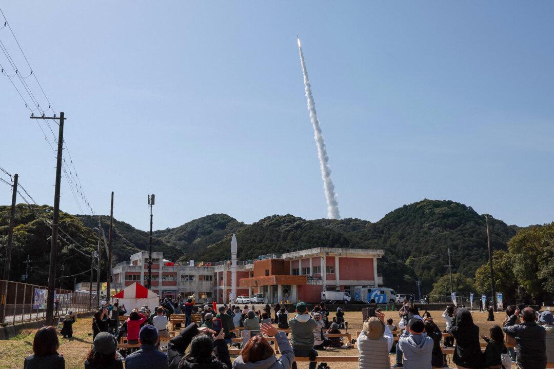 The launch scene of Kairos No. 3 is watched by people in Nachikatsuura Town, Wakayama Prefecture on March 5, 2026. A Japanese startup aiming to become the country's first private company to put a satellite into orbit said on March 5, it aborted the launch of its space rocket just after takeoff. (Photo by JIJI PRESS / AFP via Getty Images) / Japan OUT