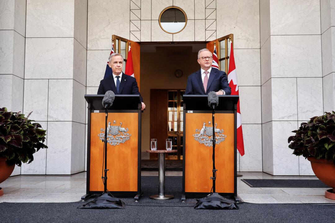 CANBERRA, AUSTRALIA - MARCH 05: Canadian Prime Minister Mark Carney (L) and Australian Prime Minister Anthony Albanese hold a press conference at Australian Parliament House on March 05, 2026 in Canberra, Australia. Carney is in Australia to discuss trade and other matters. (Photo by Hilary Wardhaugh/Getty Images)