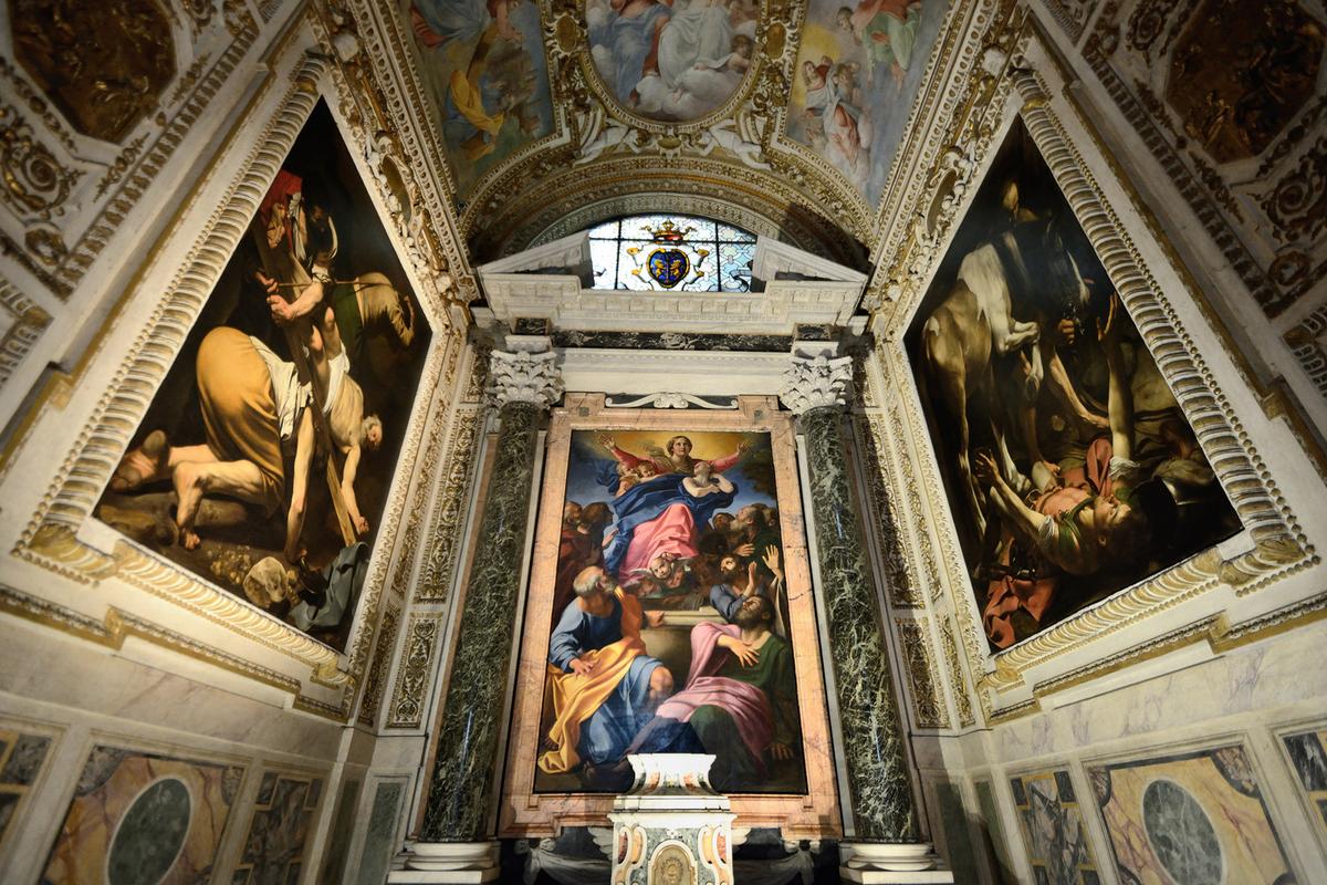 Two of Caravaggio's paintings are in the Cerasi Chapel in the Basilica di Santa Maria del Popolo in Rome. "The Crucifixion of St. Peter" is on the left and "The Conversion of St. Paul" on the right. In the center is "The Assumption of the Virgin" by Annibale Carracci. (Bruno Brunelli/Getty Images)