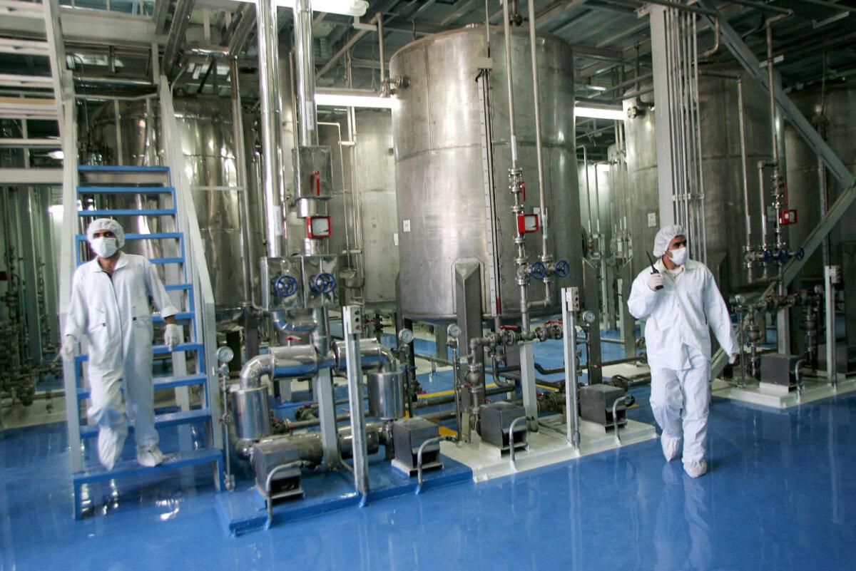 Iranian technicians at at the Isfahan Uranium Conversion Facilities, about 261 miles south of Tehran, on Aug. 8, 2005. (Behrouz Mehri/AFP via Getty Images)