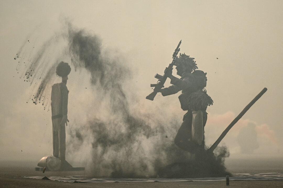 An Indian army cadet performs drills ahead of the graduation ceremony at the Officers Training Academy in Chennai, India, on March 6, 2026. (R. Satish BABU / AFP via Getty Images)