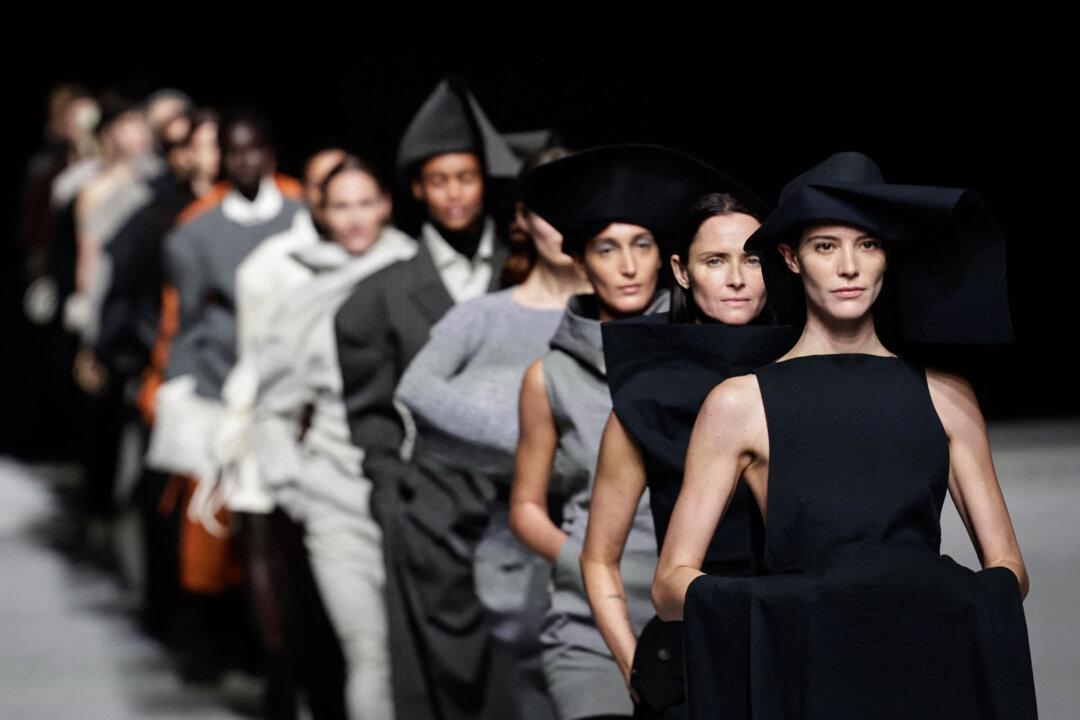 Models present creations by Issey Miyake for the Women's Ready to Wear Fall/Winter 2026-2027 collection fashion show as part of the Paris Women Fashion Week, in Paris, on March 6, 2026. (Stephane de Sakutin / AFP via Getty Images)