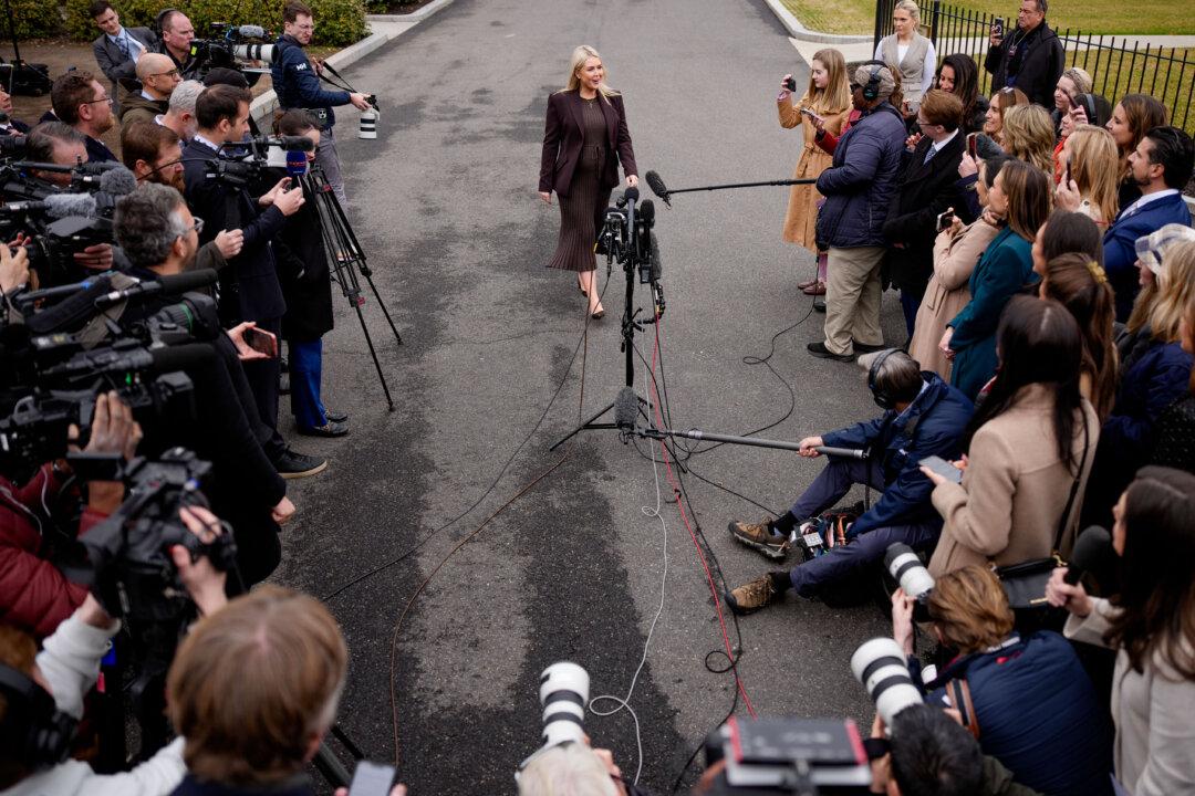 White House Press Secretary Karoline Leavitt stops to speaks to members of the media following a television interview on the North Lawn of the White House on March 6, 2026. (Andrew Harnik/Getty Images)