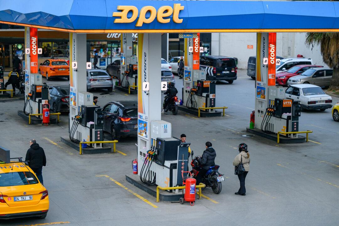People refile their tank at a petrol station in Istanbul on March 6, 2026 as fears have grown of a possible inflationary wave as war in the Middle East sends energy prices shooting upwards. (Yasin Akgul / AFP via Getty Images)