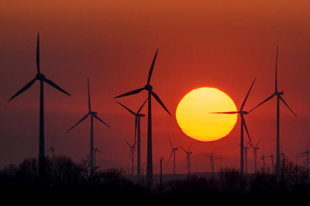 Sun sets behind wind mills near Kittsee, Lower Austria bordering with Slovakia on March 06, 2026. Lower Austria is the leading state for wind energy in Austria, hosting over 800 wind turbines, this represents more than half of the total wind turbines in the entire country, with further expansion planned to increase capacity to 8,000 GWh by 2030. (Photo by Joe Klamar / AFP via Getty Images)