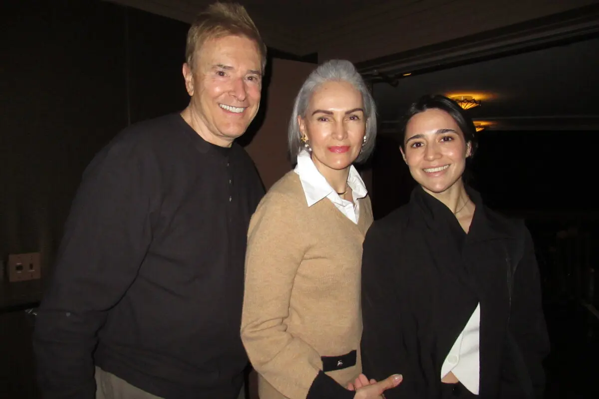 Mariana Amero, (R) with her aunt and uncle, Mercedes Amero and Rick Ricker, at the Shen Yun Performing Arts performance at The Smith Center for the Performing Arts on March 8, 2026. (Linda Jiang/The Epoch Times)