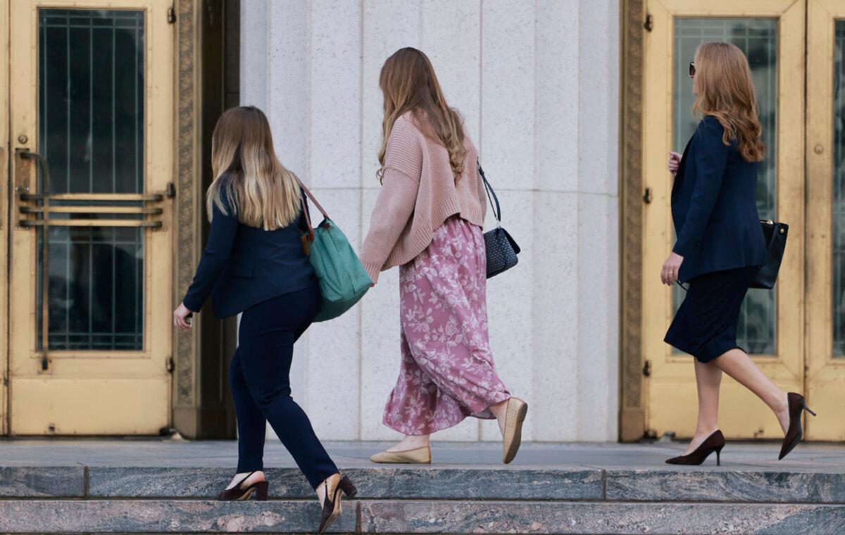 Plaintiff "K.G.M." (C) arrives at the Los Angeles Superior Court on Feb. 26, 2026. She was scheduled to testify in a landmark case accusing Meta and YouTube of building addictive social media platforms, causing harm to children. (Mario Tama/Getty Images)