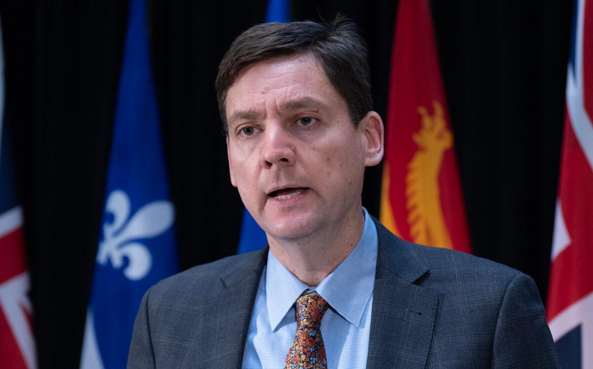 B.C. Premier David Eby speaks with reporters in Ottawa on Jan. 29, 2026. (The Canadian Press/Adrian Wyld)