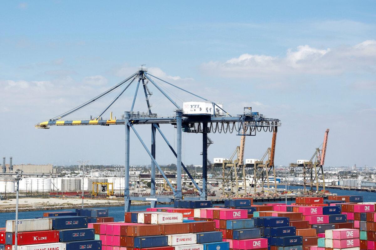 Shipping containers are stacked at a terminal at the port of Los Angeles in Long Beach, Calif., on March 10, 2026. (Caroline Brehman/Reuters)