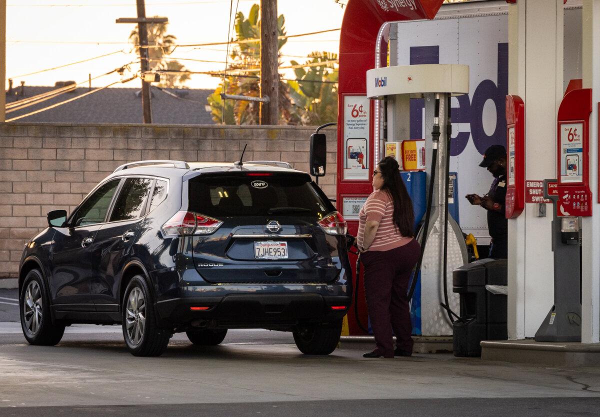 Customers fill up with gas in Los Angeles on March 11, 2026. (John Fredricks/The Epoch Times)