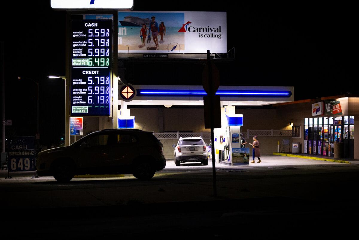 Customers use a gas station in Los Angeles on March 11, 2026. (John Fredricks/The Epoch Times)