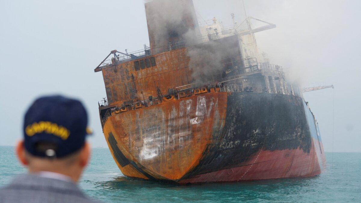 A damaged oil tanker in Iraq's territorial waters, following unidentified attacks that targeted two foreign tankers, near Basra, Iraq, on March 12, 2026. (Mohammed Aty/Reuters)