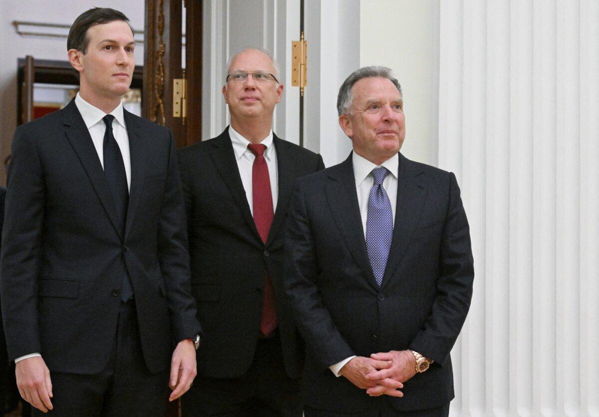 U.S. special envoy Steve Witkoff (R) and U.S. President Donald Trump's son-in-law Jared Kushner (L), accompanied by Kremlin economic envoy Kirill Dmitriev (C), prior to a meeting with Russia's president at the Kremlin in Moscow on Dec. 2, 2025. (Kristina Kormilitsyna/AFP via Getty Images)
