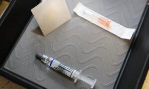 Woman Whose Children Died After Vaccinations Charged With Murder