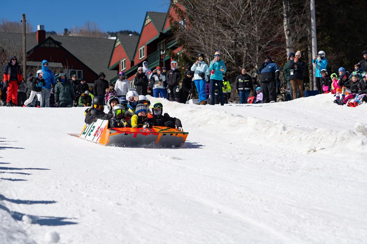 A group of kids participate in Mount Snow’s annual spring tradition, the Duct Tape Derby. Teams build vessels consisting of cardboard, duct tape, zip ties, and paint. (Brooke Cerbone/Vail Resorts)