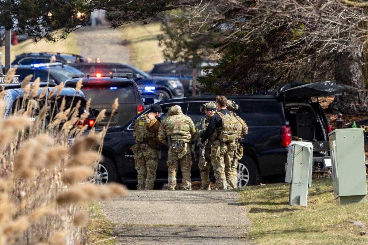 Police respond to the scene of a shooting and vehicle attack near Temple Israel in West Bloomfield, Mich., on March 12, 2026. (Jacob Hamilton/Ann Arbor News via AP)