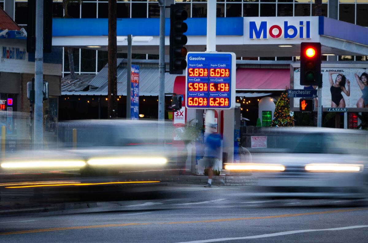 Traffic moves past a gas station in Los Angeles on March 11, 2026. Oil prices have gone up since the start of the Iran war in late February. (John Fredricks/The Epoch Times)
