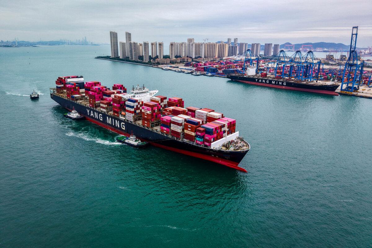 A cargo ship sails into the port in Qingdao, Shandong Province, China, on Oct. 13, 2025. (AFP via Getty Images)
