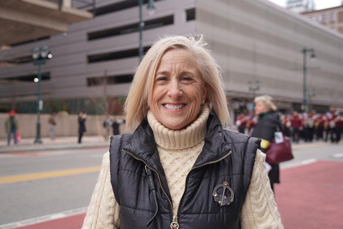 Alice Penza, who lives in Philly but works in New Jersey, enjoys the parade with her family every year. (William Huang/The Epoch Times)