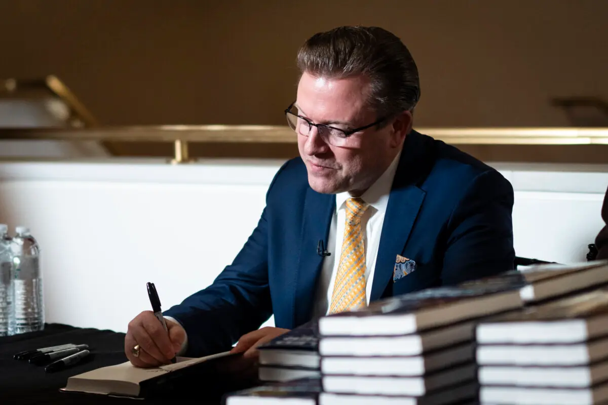 Jan Jekielek, Epoch Times senior editor and host of American Thought Leaders, during his book launch “Killed to Order” at the Trump-Kennedy Center in Washington on March 16, 2026. (Madalina Kilroy/The Epoch Times)