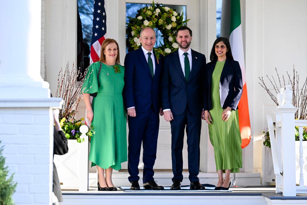 WASHINGTON, DC - MARCH 17: US Vice President JD Vance and second lady Usha Vance greet the Taoiseach of Ireland Micheál Martin and his wife Mary O'Shea before a breakfast at the Vice President's residence in the US Naval Observatory on March 17, 2026 in Washington, DC. The Irish Prime Minister arrived in the United States March 13 for an annual St Patrick's Day trip and will meet with US President Donald Trump later today. (Photo by Roberto Schmidt-Pool/Getty Images)
