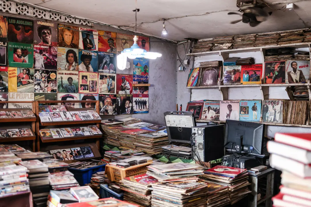 A general view of the vinyl record collection in Guy Samba's shop in Brazzaville, Congo, on March 18, 2026. Guy Samba says he inherited the vinyl record collection after his father's death and would like to pass it on to his own children. At his shop customers can buy cassettes, DVDs and vinyl records. To update his stock of vinyls, he offers to buy them from customers wishing to part with them. (Daniel Beloumou Olomo / AFP via Getty Images)