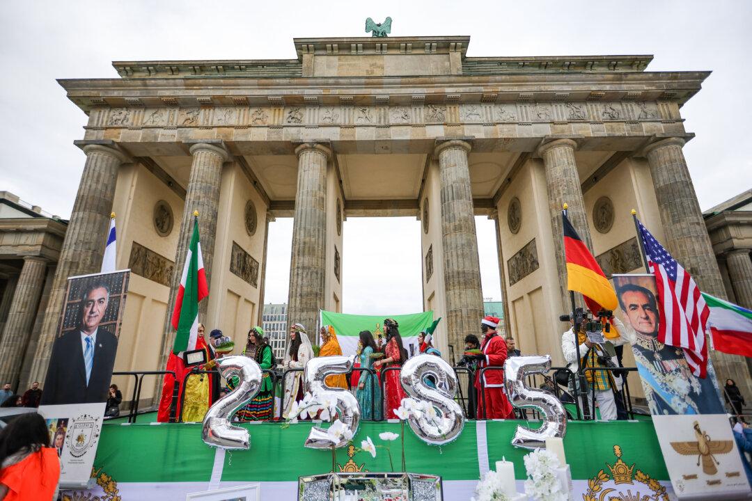 BERLIN, GERMANY - MARCH 20: A display of images of Reza Pahlavi and balloons forming the number 2585 are seen as people, many of them expatriate Iranians living in Berlin, gather to celebrate Nowroz, the Persian new year, on March 20, 2026 in Berlin, Germany. Meanwhile the U.S. and Israel are continuing their airstrikes in Iran and Iran is responding with missile and drone attacks against Gulf states and their energy infrastructure. (Photo by Omer Messinger/Getty Images)