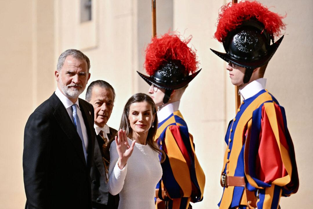 TOPSHOT - King Felipe VI of Spain and Queen Letizia arrive for a private audience with Pope Leo XIVon March 20, 2026 at San Damaso courtyard in The Vatican. (Photo by Filippo MONTEFORTE / AFP via Getty Images)