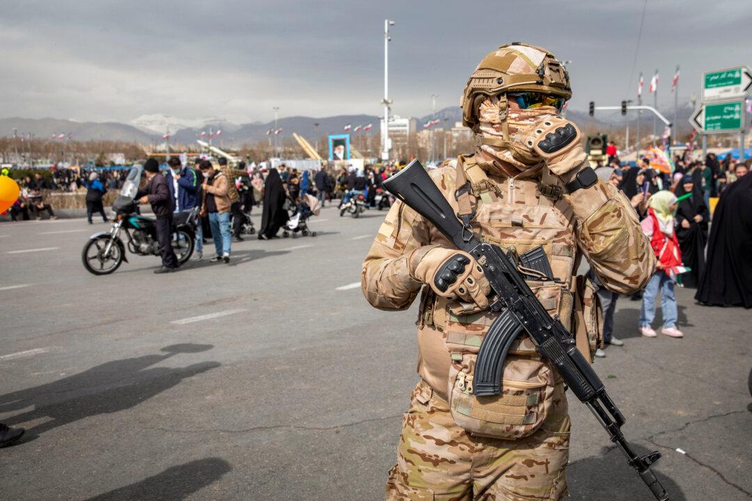 An Iranian special forces soldier stands guard during commemorations to mark the anniversary of the 1979 Iranian Revolution in Tehran, Iran, on Feb. 11, 2026. (Majid Saeedi/Getty Images)
