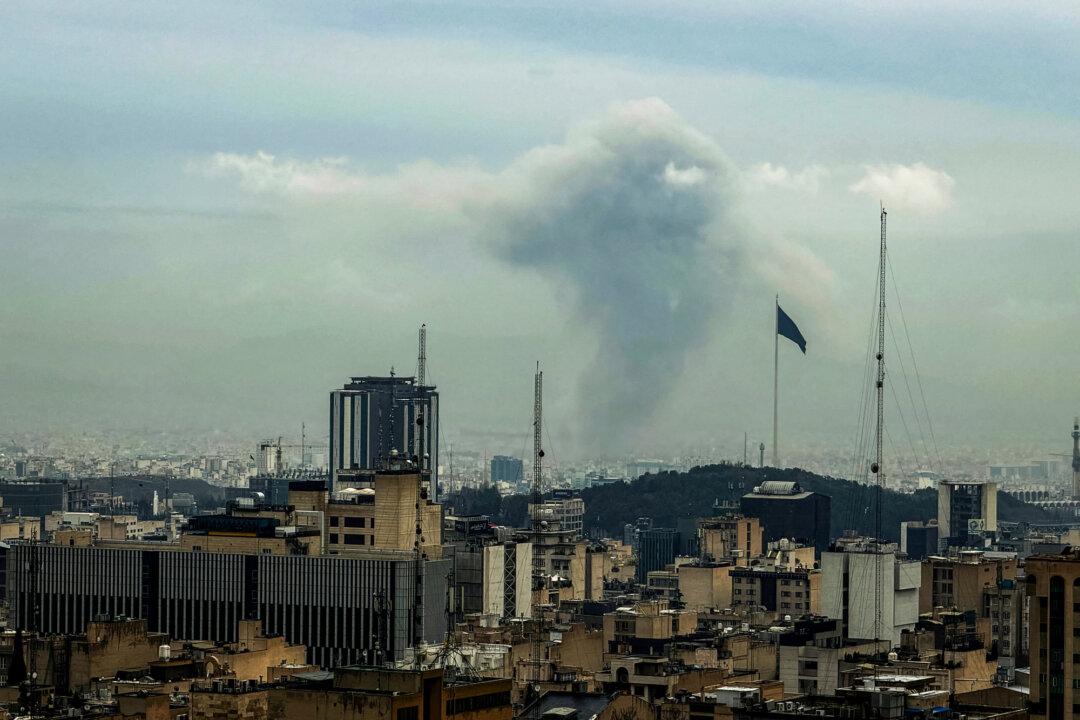 A plume of smoke rises from the site of a strike in Tehran, Iran, on March 16 (L) and March 17 (R), 2026. (Atta Kenare / AFP via Getty Images)