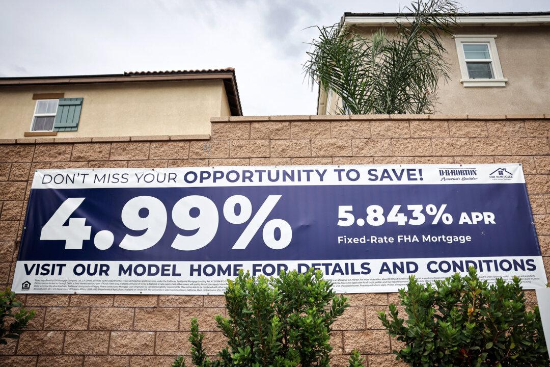 A sign advertises mortgage rates for new homes in a gated community in Fontana, Calif., on Sept. 17, 2025. President Donald Trump has proposed 50-year mortgages as part of his housing reform plans. (Mario Tama/Getty Images)