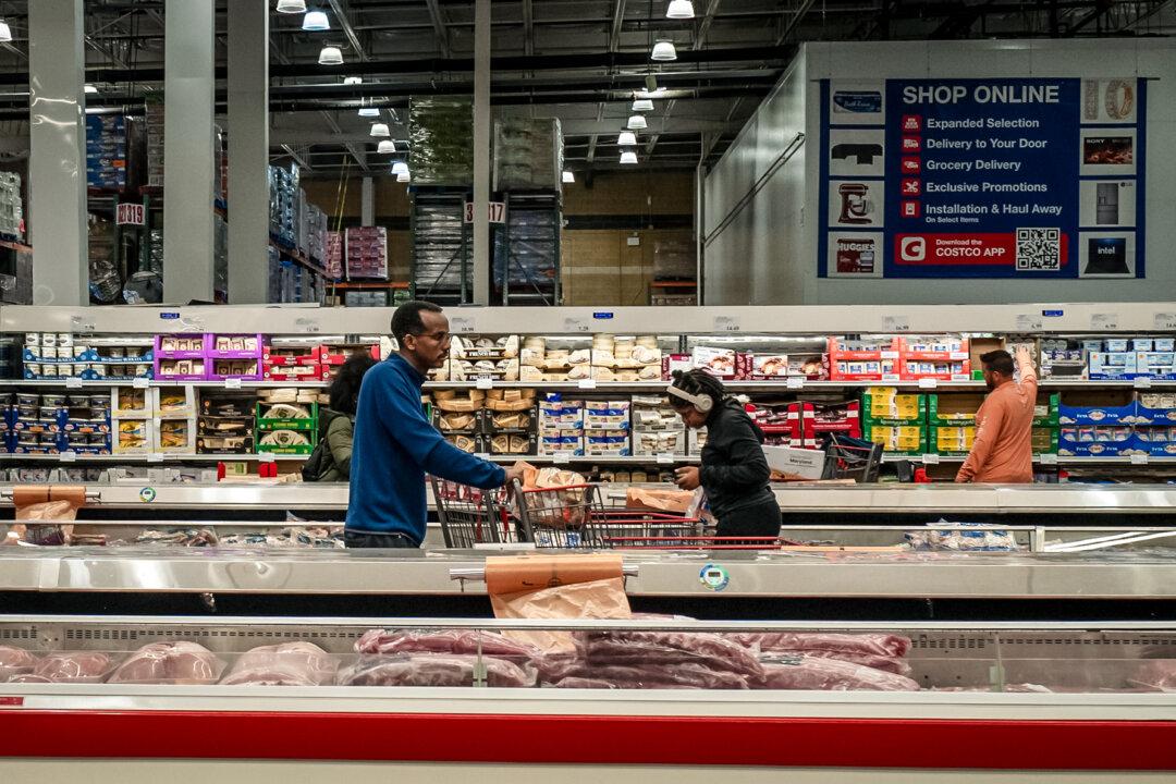 People shop at a grocery store in Elkridge, Md., on Oct. 24, 2025. Although wages have outpaced inflation over the past two years, they fell behind during the COVID-era inflation surge and have since struggled to keep pace. (Madalina Kilroy/The Epoch Times)