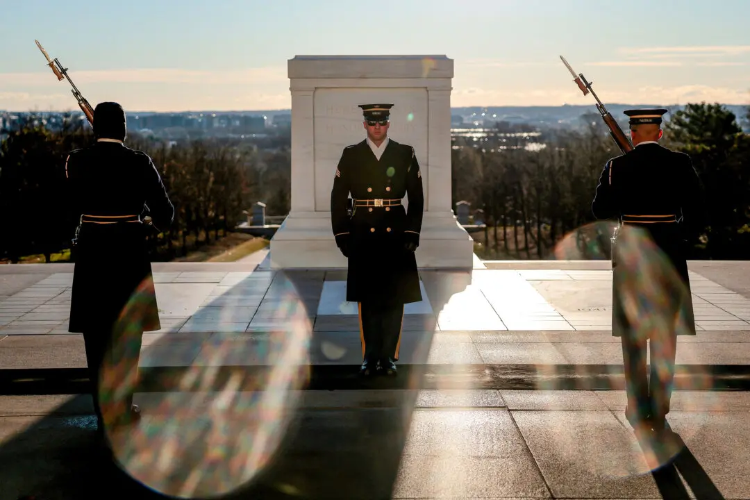 America in Photos: Tomb of the Unknown Soldier, ‘Killed to Order’ Book Launch, and 100K Ultramarathon