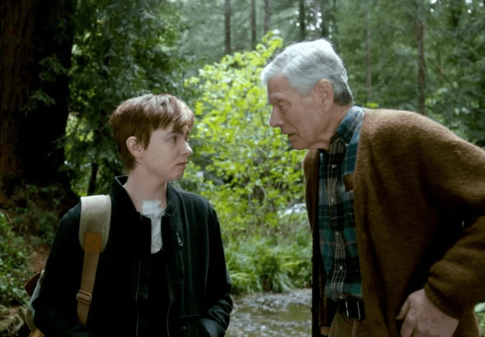 Abby (Elsie Fisher) and Herbert (Stephen Lang) go on a healing journey, in "The Optimist: The Bravest Act Is Truth." (Trafalgar Releasing)