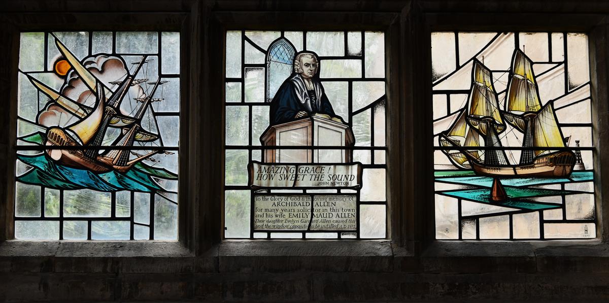 Stained-glass image of John Newton at St Peter and Paul Church in Olney, Buckinghamshire, where Newton served as parish priest. (<a class="external text" href="https://www.geograph.org.uk/profile/118660" rel="nofollow">Michael Garlick</a>/<a href="https://creativecommons.org/licenses/by-sa/2.0/deed.en" target="_blank" rel="nofollow noopener">CC BY-SA 2.0</a>)