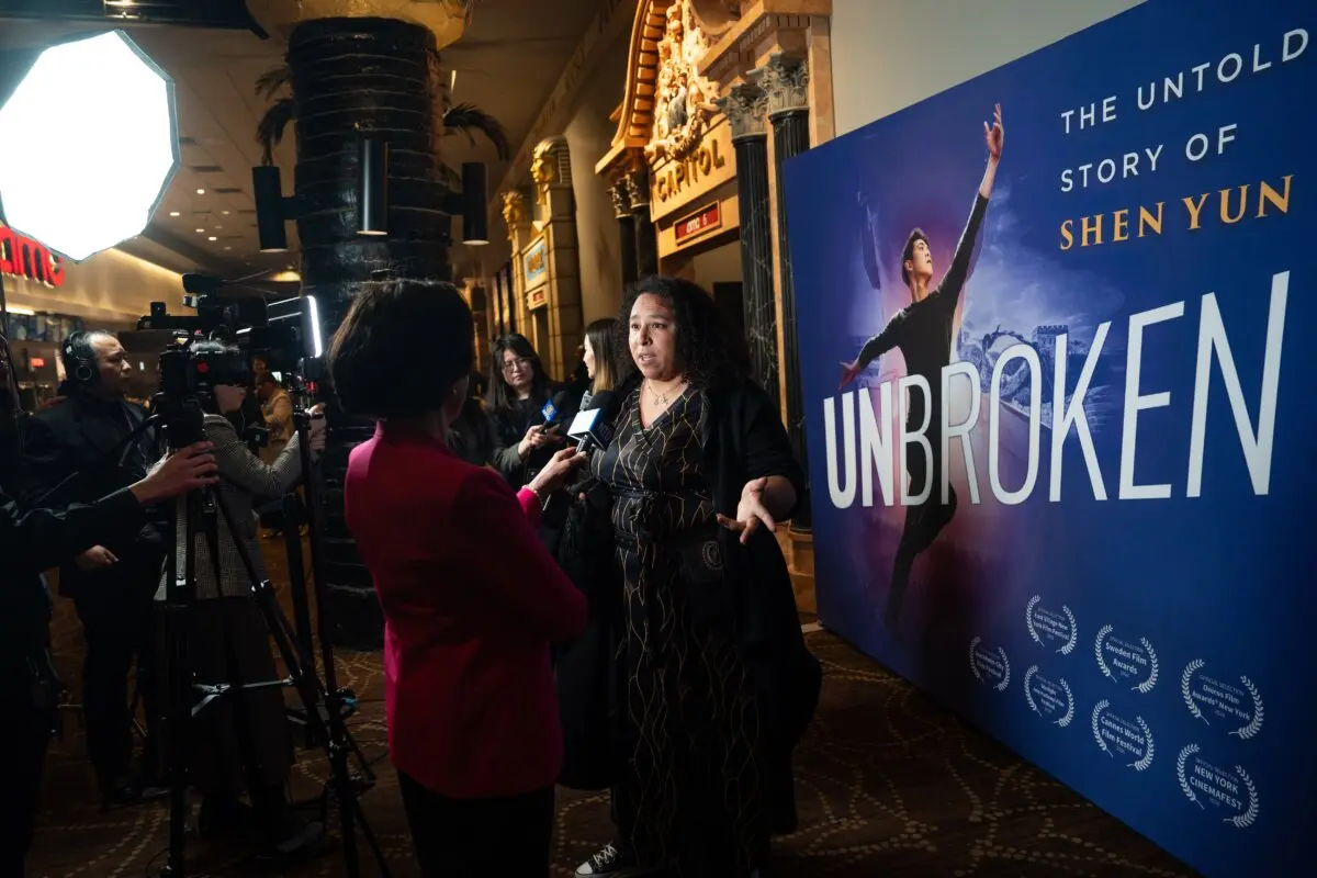 Audience members are interviewed at the world premiere of "Unbroken: The Untold Story of Shen Yun" at AMC Theater at Lincoln Square in New York City on March 24, 2026. (Samira Bouaou/The Epoch Times)