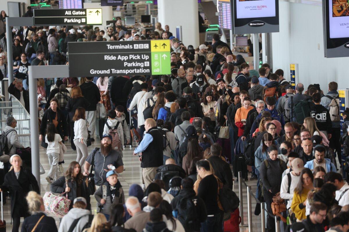 People wait in long security lines at LaGuardia Airport on March 25, 2026 in the Queens borough of New York City. (Spencer Platt/Getty Images)