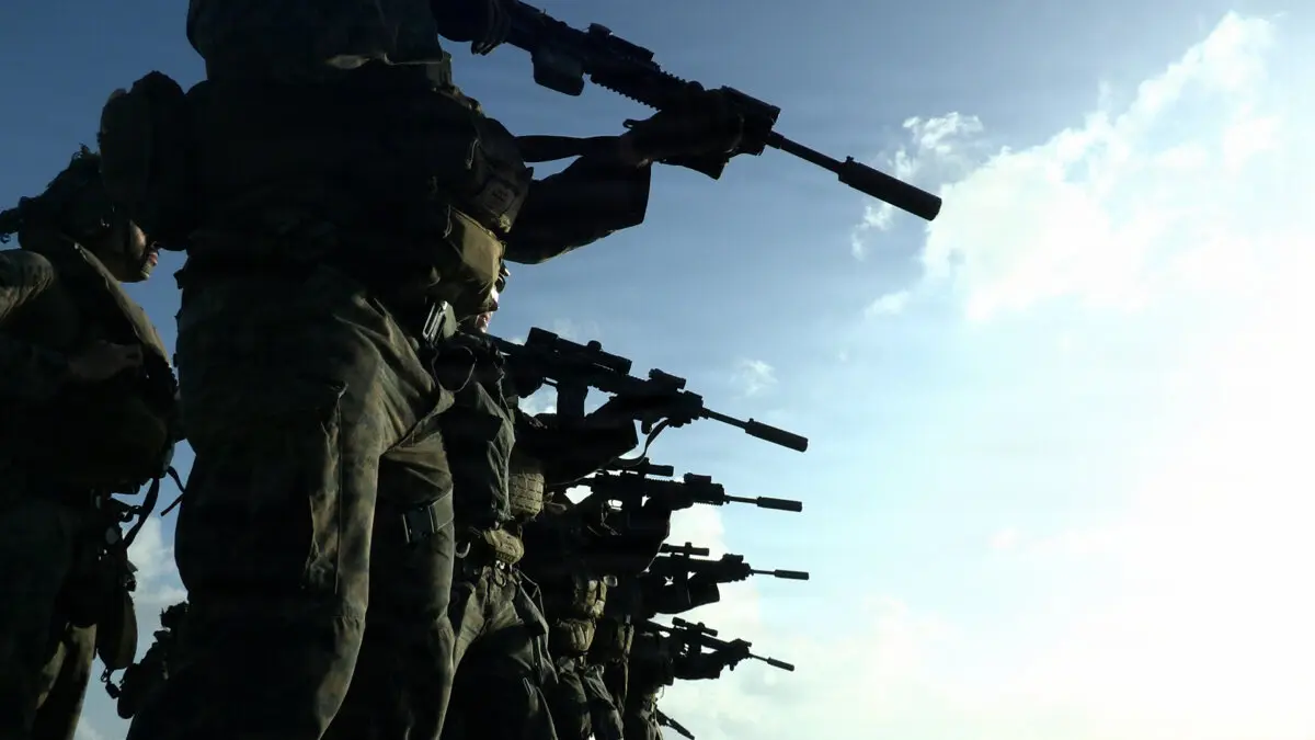U.S. Marines with the 31st Marine Expeditionary Unit conduct a live fire deck shoot aboard the amphibious assault ship USS Tripoli, in the Philippine Sea on March 16, 2026. (U.S. Marine Corps photo by Lance Cpl. Gerardo Méndez)