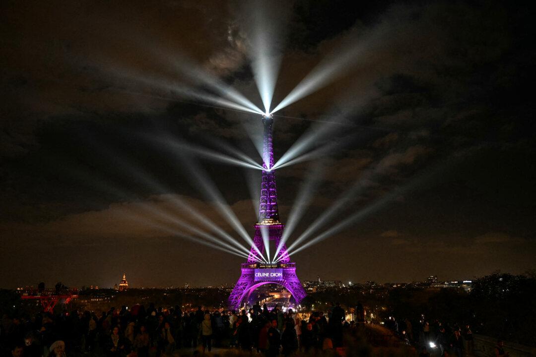 The Eiffel Tower is illuminated to celebrate the 58th Birthday of Canadian singer Celine Dion, in Paris, on March 30, 2026. To celebrate her 58th birthday, Celine Dion announced a series of ten concerts in September and October in Paris, officially marking her return after six years away from the stage. (Anna Kurth / AFP via Getty Images)