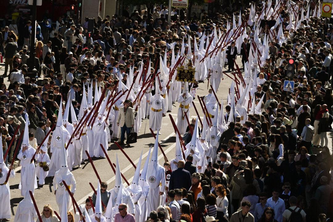 Penitents of the San Gonzalo brotherhood take part in the Holy Monday procession in Seville, Spain, on March 30, 2026. Christian believers around the world mark Holy Week in celebration of the crucifixion and resurrection of Jesus Christ. (Cristina Quicler / AFP via Getty Images)